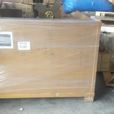 A single item professionally wrapped and labeled before loading