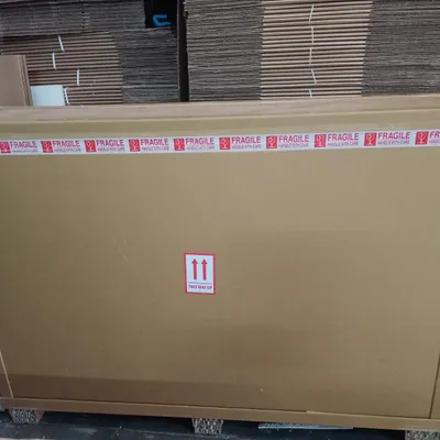 Stacks of corrugated boxes and packing materials in our warehouse